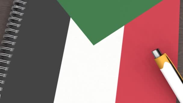 Notebook Flag Sudan Lying Pen — Stockvideo
