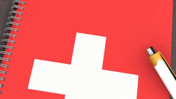 Notebook Flag Switzerland Lying Pen — Vídeo de Stock