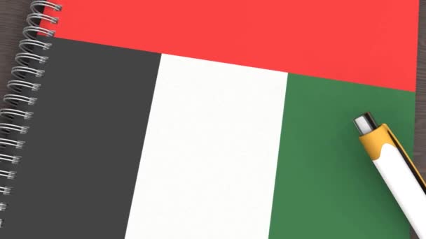 Notebook Flag United Arab Emirates Lying Pen — стоковое видео