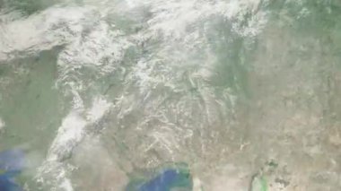 Dünyanın uzaydan şehire yakınlaşması. Üç boyutlu animasyon. Kazakistan 'ın Uralsk şehrine yakınlaş. Video görüntülerini stokla. 4K