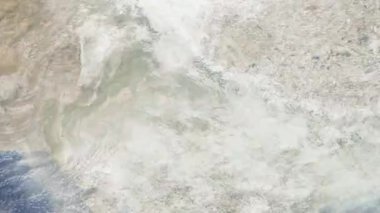 Dünyanın uzaydan şehire yakınlaşması. Üç boyutlu animasyon. Faridabad, Hindistan 'a yakınlaş. Video görüntülerini stokla. 4K