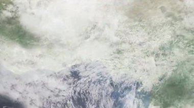 Dünyanın uzaydan şehire yakınlaşması. Üç boyutlu animasyon. Ibadan, Nijerya 'ya yakınlaş. Video görüntülerini stokla. 4K