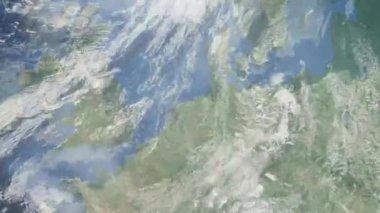 Dünyanın uzaydan şehire yakınlaşması. Üç boyutlu animasyon. Hollanda, Groningen şehrine yakınlaş. Video görüntülerini stokla. 4K