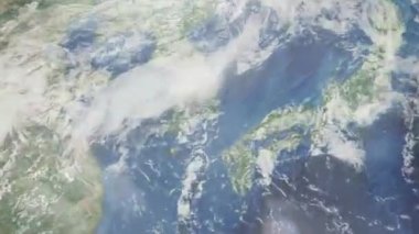 Dünyanın uzaydan şehire yakınlaşması. Üç boyutlu animasyon. Güney Kore, Gimhae şehrini yakınlaştır. Video görüntülerini stokla. 4K