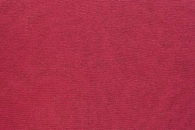 Parlak pembe kumaş. Kumaşın dokusu..