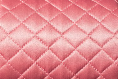 Pembe saten örtülü kumaş. Yatay fotoğraf, kumaşın dokusu, sevgililer günü kartı için arka plan..