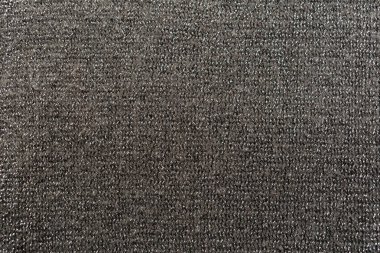 Koyu gri örgü örgü. Parlak iplik kullanıyor..