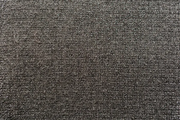 stock image Dark gray knitted knitwear using shiny thread.