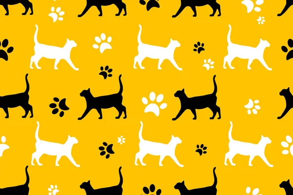 シルエット黄色の背景に足跡記号を持つ黒と白の猫 動物の質感シームレスなパターン — ストックベクタ