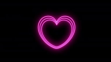 Pembe kalp işaretinin parlak neon ışığı yanıp sönüyor. 