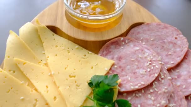 Appetizers Board Assorted Cheese Meat Sausage Rosette Honey Dried Orange — Wideo stockowe