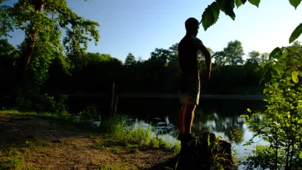 Silhouette Young Man Gymnast Doing Backflip Sunset — Stock Video