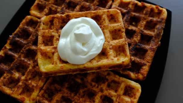 Belgian Waffle Sour Cream Black Plate Biege Background Top View — Stock video