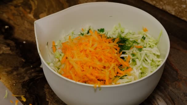Woman Adding Carrot Delicious Salad White Table Closeup — Αρχείο Βίντεο