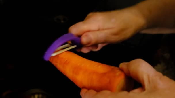 Man Hands Preparing Meal Peeling Carrot — Stock Video
