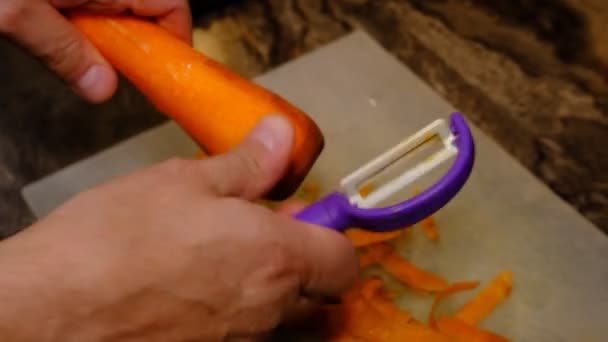 Old Woman Hands Preparing Meal Peeling Carrot — Stock Video