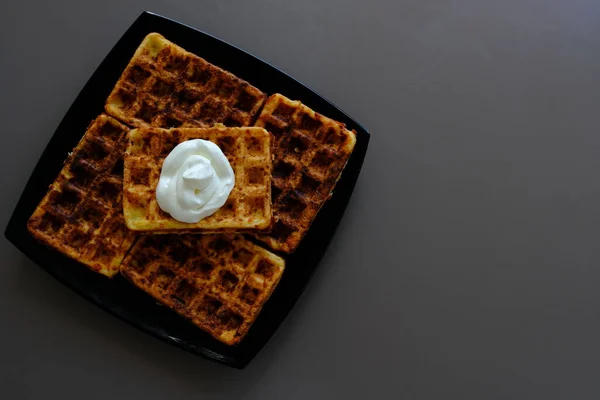 Belgian Waffles Black Plate Biege Table Souse Sour Cream — Photo
