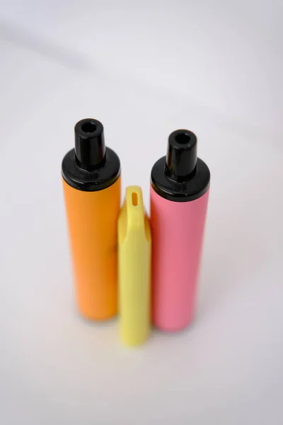 Pink Orange Little Yellow Disposable Electronic Cigarettes White Background Copy — Stock fotografie