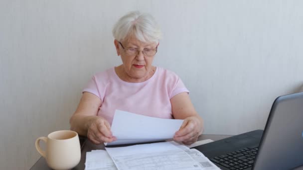 Financial Problems Disappointed Senior Lady Reading Document Working Documents Laptop — Video Stock