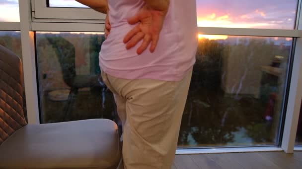 Lower Back Pain Elderly Person Back Pain Senior Woman Window — Vídeo de stock