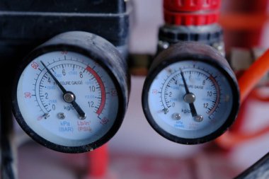 Pressure gauge, measuring instrument on pneumatic control system. Pressure differential gauge, Pressure gauge in industry production process for monitor condition.