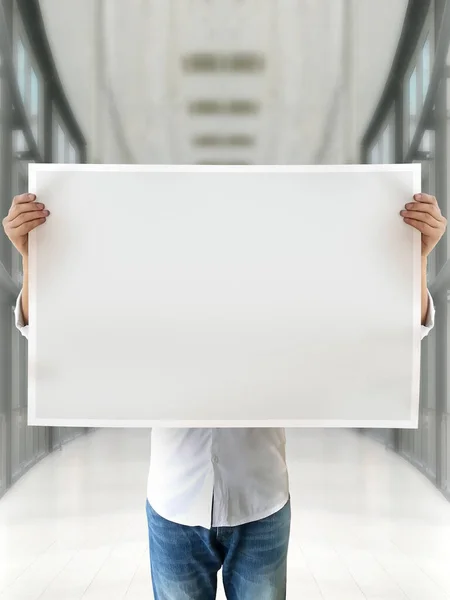 One person holding blank poster mockup