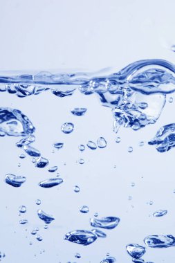 Transparent blue colored clear water surface texture