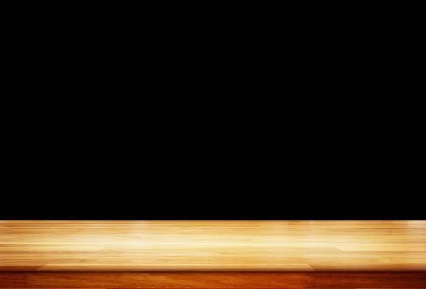 黒い背景に空の木製テーブル — ストック写真