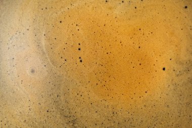Kahve desenli arka plan. Sert espresso koyu kahve köpüğü yakın plan. 