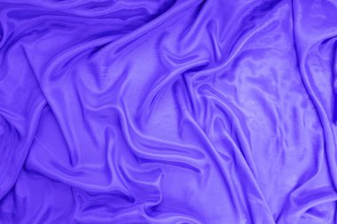 Akan lavanta saten kumaş dokusu. Metnin için boş yer. Kumaşın branda dokusu ya da arka planı. Doku ve yüzeyi. Arka plan. parlak renkli ve zengin kumaş