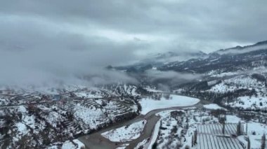 Clouds high in the mountains Aerial view
