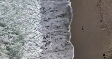 Storm at sea filmed on a drone in the sunset
