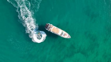 Jet ski rides around the yacht