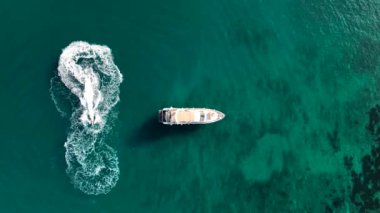 Jet ski rides around the yacht