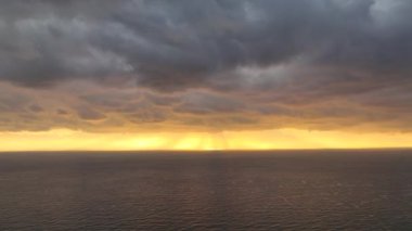 Cloudy sunset at sea