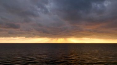 Cloudy sunset at sea