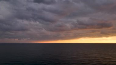 Cloudy sunset at sea