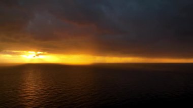 Cloudy sunset at sea