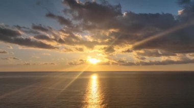 Cloudy sunset at sea