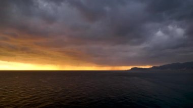 Cloudy sunset at sea
