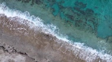 sea filmed on a drone in the sunset