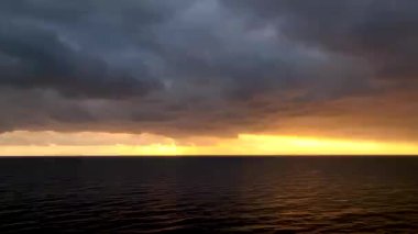 Cloudy sunset at sea