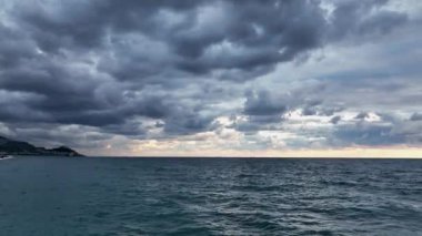 Cloudy sunset at sea