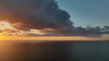 Cloudy sunset at sea