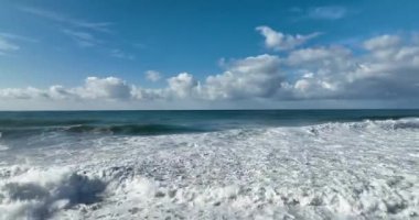 Storm at sea filmed on a drone in the sunset