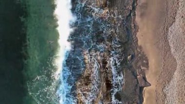 sea filmed on a drone in the sunset