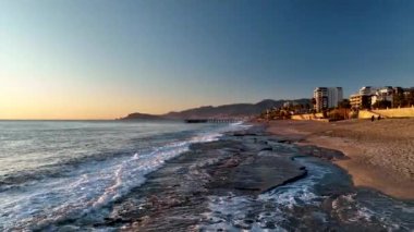sea filmed on a drone in the sunset