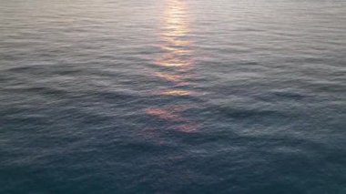 sea filmed on a drone in the sunset