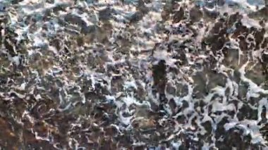 sea filmed on a drone in the sunset