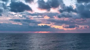 Cloudy sunset at sea